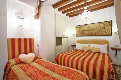Letto o letti in una camera di San Luca Flats