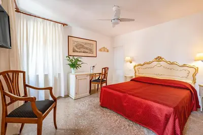 Letto o letti in una camera di San Luca Flats