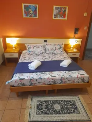 Letto o letti in una camera di Hotel Amba Alagi