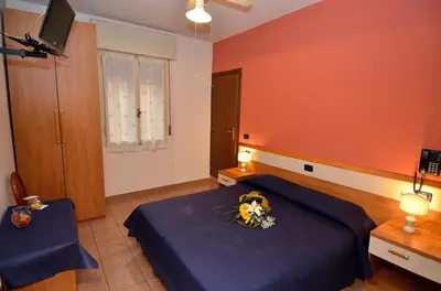 Letto o letti in una camera di Hotel Amba Alagi