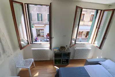 Letto o letti in una camera di WellVenice Cà D'Oro