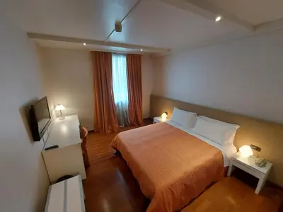 Letto o letti in una camera di Hotel Posta 77
