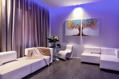 Area soggiorno di Le Camp Suite & Spa