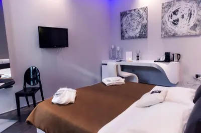 Letto o letti in una camera di Le Camp Suite & Spa