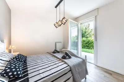 Letto o letti in una camera di Tigli Suite