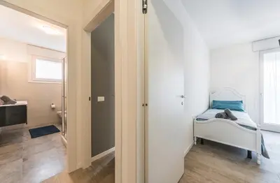 Letto o letti in una camera di Tigli Suite