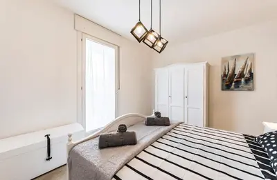 Letto o letti in una camera di Tigli Suite