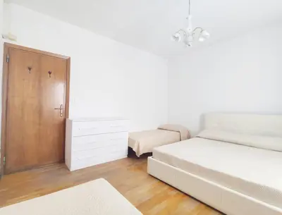Letto o letti in una camera di LCC - Centralissimo - 100 mt da Piazza Mazzini - 50 mt dal mare - Immobil Relax
