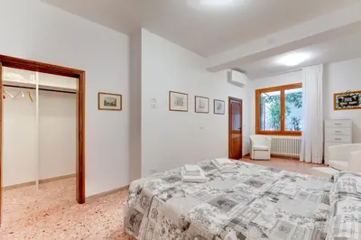 Letto o letti in una camera di San Stin
