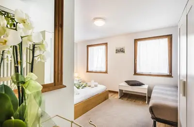 Letto o letti in una camera di LA LOGGETTA - locazione turistica