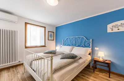 Letto o letti in una camera di LA LOGGETTA - locazione turistica