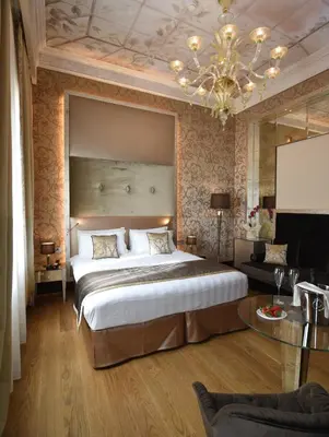 Letto o letti in una camera di Santa Croce Boutique Hotel