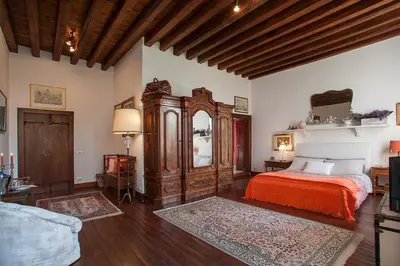 Letto o letti in una camera di Villa Irene