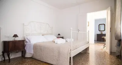 Letto o letti in una camera di Cà Lina