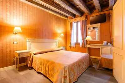 Letto o letti in una camera di Lanterna Di Marco Polo