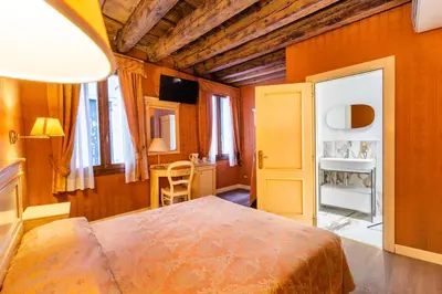 Letto o letti in una camera di Lanterna Di Marco Polo