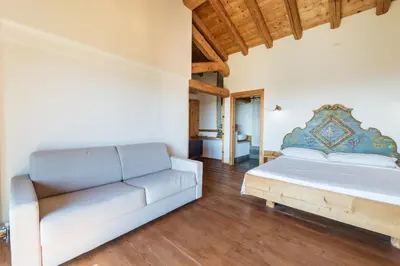 Letto o letti in una camera di Agriturismo Dolce Colle