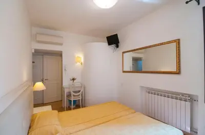 Letto o letti in una camera di Albergo ai Tolentini