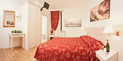 Letto o letti in una camera di Albergo ai Tolentini