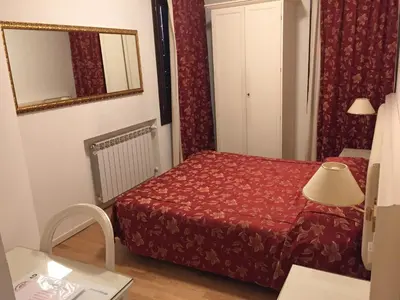 Letto o letti in una camera di Albergo ai Tolentini