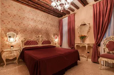 Letto o letti in una camera di Dimora Marciana