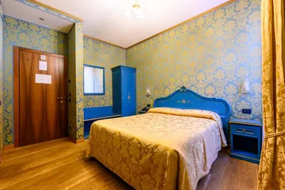 Letto o letti in una camera di Residenza Ca' San Marco