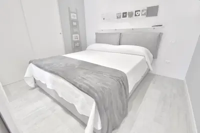 Letto o letti in una camera di Vistamare Apartments