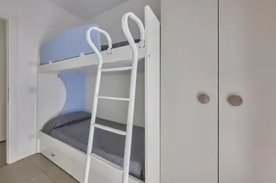 Letto o letti in una camera di Equilium Apartments