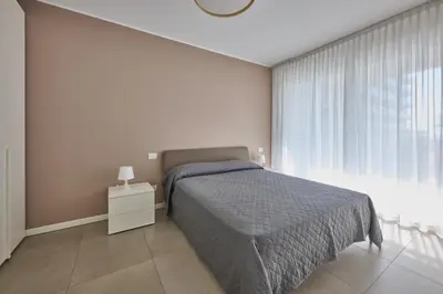 Letto o letti in una camera di Equilium Apartments