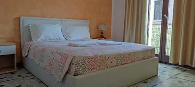 Letto o letti in una camera di The Caponi Bros