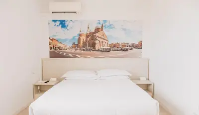 Letto o letti in una camera di M14 SkyView City Center