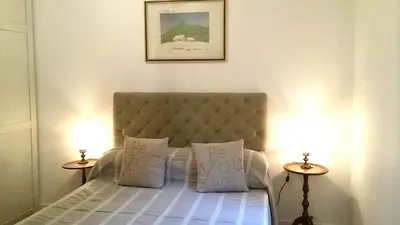 Letto o letti in una camera di Casa Isabella