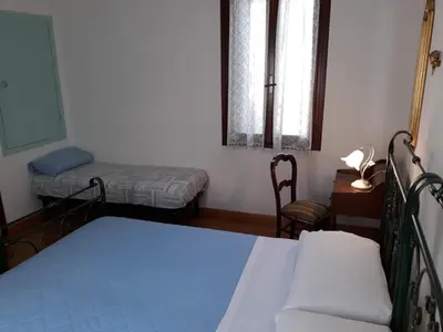 Letto o letti in una camera di San Barnaba Artist's district house
