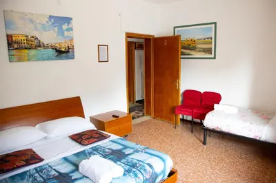 Letto o letti in una camera di Venice Concordia Guesthouse