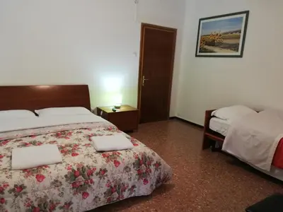 Letto o letti in una camera di Venice Concordia Guesthouse