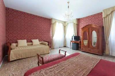 Letto o letti in una camera di B&B Al Palazzetto