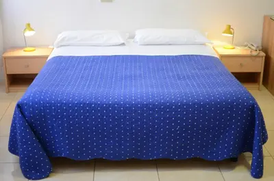 Letto o letti in una camera di Alloggi Barbaria