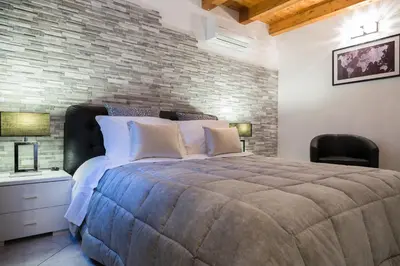 Letto o letti in una camera di Stella Marina 5