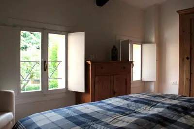 Letto o letti in una camera di Alla vigna
