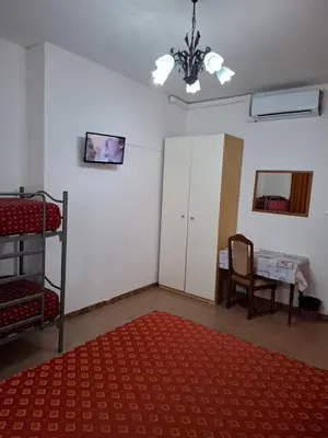 Letto o letti in una camera di LOCAZIONE TURISTICA Sansevero Venice