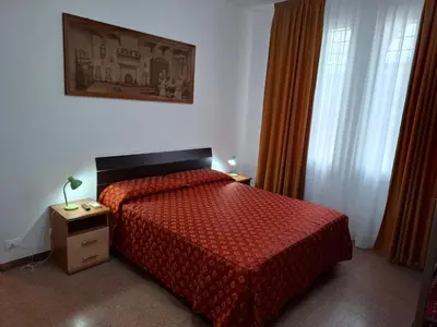 Letto o letti in una camera di LOCAZIONE TURISTICA Sansevero Venice