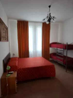 Letto o letti in una camera di LOCAZIONE TURISTICA Sansevero Venice