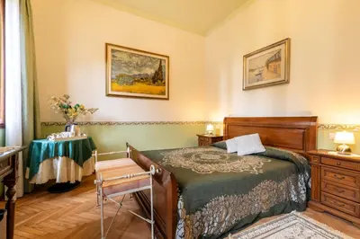 Letto o letti in una camera di Casa delle Rose Venice Lido
