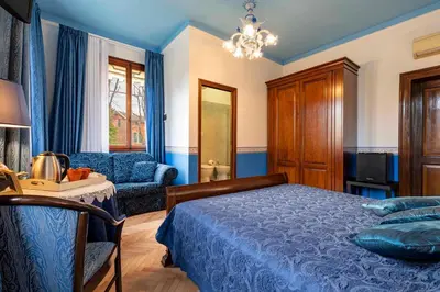 Letto o letti in una camera di Casa delle Rose Venice Lido