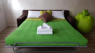Letto o letti in una camera di Ca' dell'Angelo