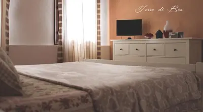 Letto o letti in una camera di B&B Terre Di Bea
