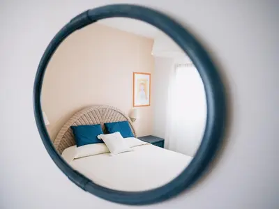 Letto o letti in una camera di Villa Carlotta Jesolo Lido