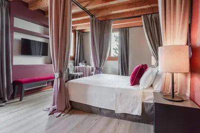 Letto o letti in una camera di Boutique Hotel Municipio 1815