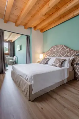 Letto o letti in una camera di Boutique Hotel Municipio 1815