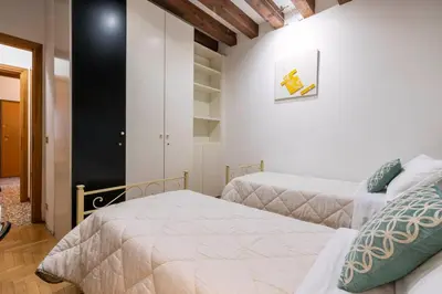 Letto o letti in una camera di San Marco - 2 bedrooms with lift